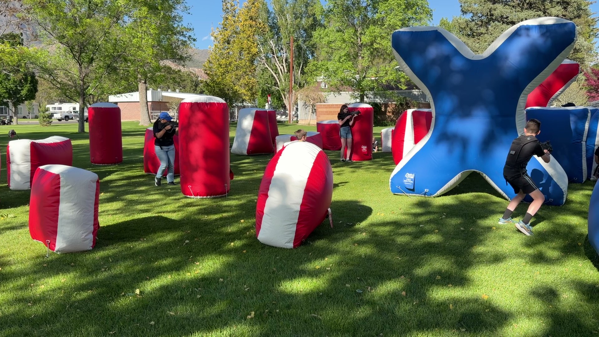 Teens playing laser tag competing to win